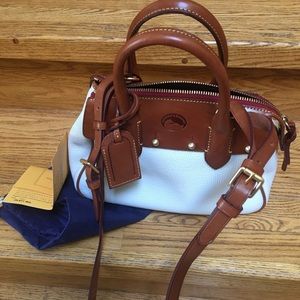 Dooney &Burke never used Mini Wilson